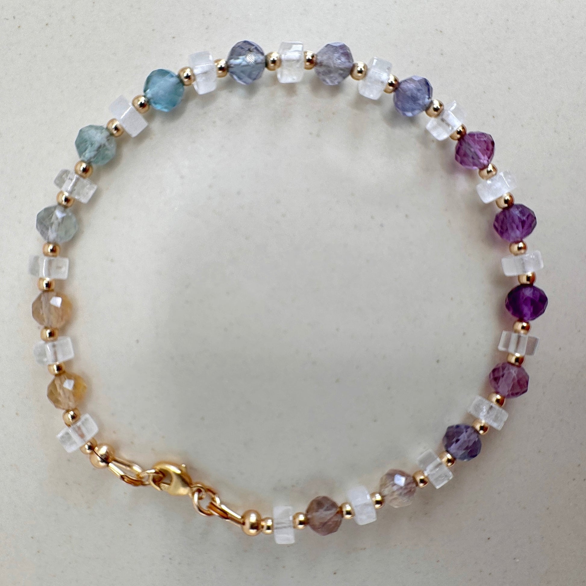 Multicolored beaded bracelet on a light background