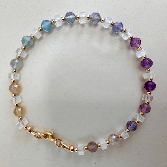 Multicolored beaded bracelet on a light background